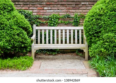 Bench In Green Formal Garden