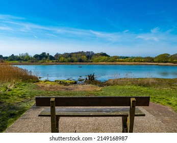 A Bench The On Western Yar Riverbank On The Isle Of Wight