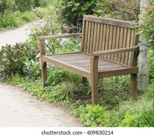 Bench in a park in spring time.