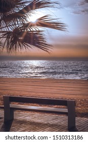 a bench at the seashore