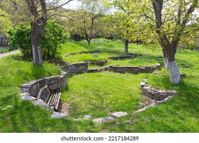 A Bench In A Spring Garden In Tbilisi. Georgia Country