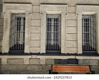 Bench, three windows, and a lighting background