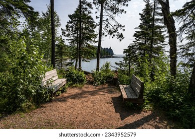 Benches on the Lake Superior Shore with a View of Split Rock Lighthouse in Minnesota