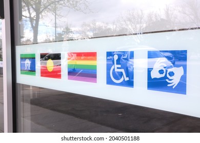 Bendigo, Australia - September 13, 2021: Aboriginal Flag, Pride Flag, Disability And Other Inclusion Signs At Store In Bendigo