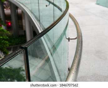 A Bending Frameless Laminated Glass Railing And Bending Aluminium Handrail. 