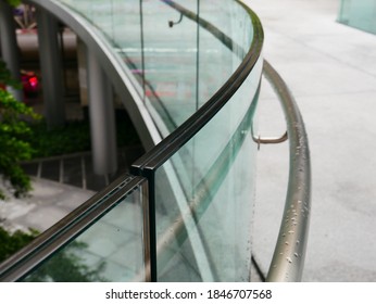 A Bending Frameless Laminated Glass Railing And Bending Aluminium Handrail. 