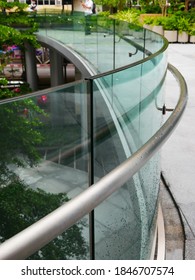 A Bending Frameless Laminated Glass Railing And Bending Aluminium Handrail. 