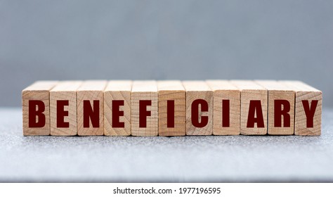 BENEFICIARY - word on wooden bars on a gray background. Business concept - Shutterstock ID 1977196595