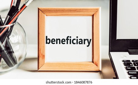 Beneficiary word in a wooden frame on the office table. Business concept. - Shutterstock ID 1846087876