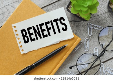 BENEFITS torn paper on a yellow notebook. potted plants - Shutterstock ID 2281465031