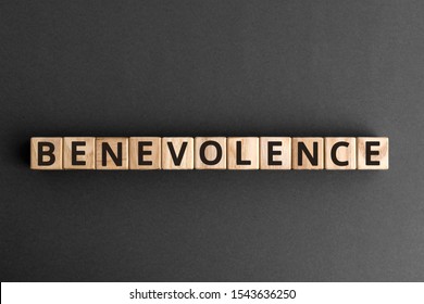 Benevolence - word from wooden blocks with letters, being kind and helpful benevolence concept,  top view on grey background - Shutterstock ID 1543636250