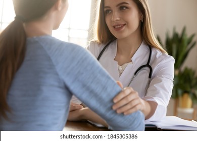 Benevolent Caring Millennial Woman General Practitioner Or Psychologist Supporting Young Girl Customer, Encouraging Take Cancer Treatment, Helping Find Patience Strength For Medical Therapy, Close Up