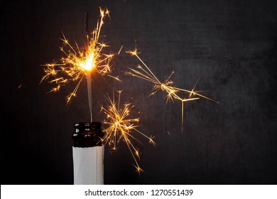 Bengal fire from a bottle of champagne - Powered by Shutterstock