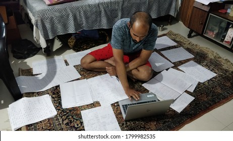 BENGALURU, INDIA - Aug 06, 2020: Indian Bald Man Works From Home During Lockdown And Pandemic.