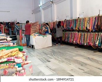 Bengaluru India January 16, 2021 Shopping For Clothes Garments And Sarees. Colourful Dress Materials, Sale. Selection Of Clothes. Selective Focus Image. Shops Open After COVID 19 Lockdown.