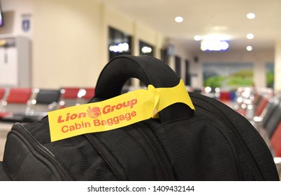 Bengkulu, Indonesia - May 07, 2019: Lion Group Airline Check In Luggage Tag, Cabin Baggage Close Up.