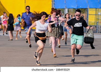 BENICASIM, SPAIN - JULY 19: People run to catch the first row after buying their tickets at FIB Festival on July 19, 2013 in Benicasim, Spain. FIB is the Spanish Coachella festival.