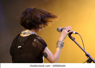 BENICASSIM, SPAIN - JULY 14: Alejandra Deheza, Frontwoman Of School Of Seven Bells Band Performs At FIB On July 14, 2012 In Benicassim, Spain. Festival Internacional De Benicassim.