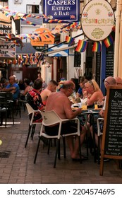 Benidorm, Alicante, Spain- September 10, 2022: Bars And Terraces Of Typical Spanish Food Full Of People In The Old Town Of Benidorm