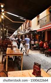 Benidorm, Alicante, Spain- September 7, 2019: Bar Of Typical Spanish Food Full Of People In The Old Town Of Benidorm