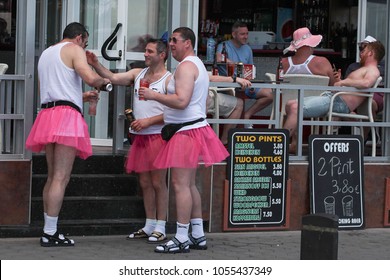 Benidorm, Spain, 30/04/2016: Drunken Men In The Costumes Of Ballerinas Near The Nightclub. Stag Party.