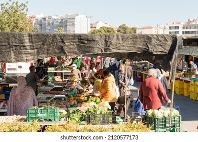 Benidorm  Spain - February 02, 2022: Street Market With Many People Shopping At The Small Stalls.