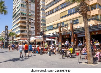 Benidorm, Spain - May 5 2022: Busy Beachside Bar Busy With Tourists Next To Playa De Levante Beach