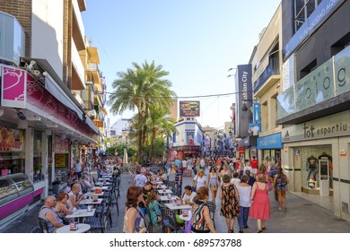 Benidorm, Spain-july 10. 2017: People Walking On The Shopping Street In Benidorm, Alicante, Spain.