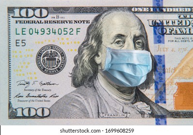 Benjamin Franklin In A Mask On A 100 Dollar Bill Isolated On White Background. Concept Of Prevention Of Money From Crisis.