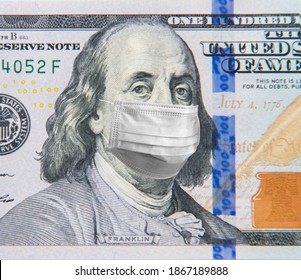 Benjamin Franklin in a mask on a 100 dollar bill isolated on white background. Concept of prevention of money from crisis. - Shutterstock ID 1867189888