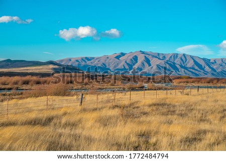 Benmore Range and Benmore Peak view from road side of State Highway 8 (SH8) into Omarama and MacKenzie Basin from the Lindis Pass, Canterbury Region, New Zealand (NZ)