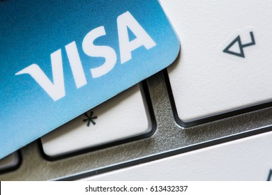 Benon, France - Feb 08, 2017: Visa Credit card on the keyboard, close up photo