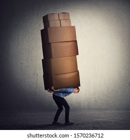 Bent down guy carrying a lot of big heavy boxes on his back. Overloaded of daily tasks, and difficult burden. Packing stuff and moving concept. Mail worker package delivery before christmas holidays. - Powered by Shutterstock