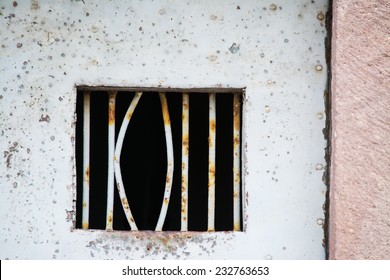 bent jail bars after a prison break. 