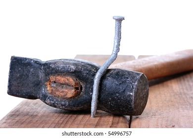 The Bent Nail Sits On A Hammer, A Metalwork Workshop.