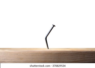 Bent nail in wood