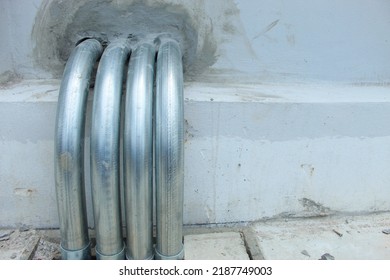 Bent Steel Pipe  Security Wiring System Outside And Inside The Building