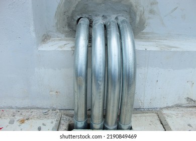 Bent Steel Pipe  Security Wiring System Outside And Inside The Building