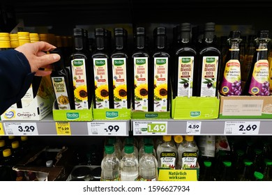 BENTHEIM, GERMANY - DECEMBER 20, 2019: Assortment BioBio Private Label Products, Bottles Vegetable Oils In A Netto Marken-Discount Supermarket.