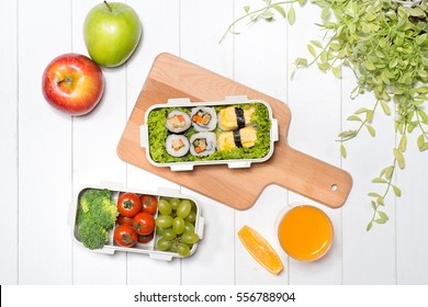 Bento Box With Different Food, Fresh Veggies And Fruits