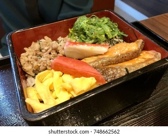 Bento Japanese Food With Rice, Fried Eggs, Samoan Fish,seaweeds Ready To Eat In Food Bowl.  