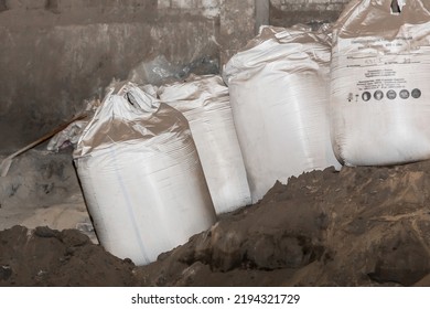 Bentonite Clay Powder Packed In Bags At An Industrial Plant For Processing Sand, Soil And Land.