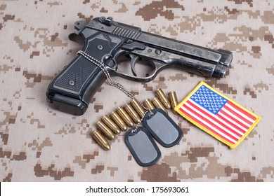 Beretta Hand Gun On  Desert Marines Uniform