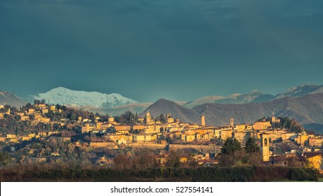 Bergamo Alta (high) with snow in the mountains
