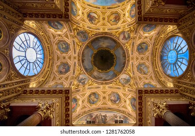Bergamo, Italy - 12.02.2020: Interior of Cathedral in Citta Alta (Cattedrale di Bergamo), a Roman Catholic cathedral . Paintings and decorations of the nave of the dome. Church