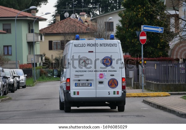 Bergamo, Italy: 23 March 2020: Civil protection\
vehicle warns the population to stay indoors due to emergency Covit\
19. Lombardy, Italy