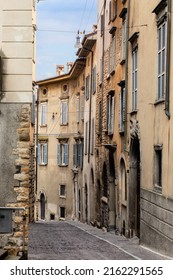 Bergamo, Italy - 29 May 2022: old narrow streets of the Bergamo Alta with traditional italian houses and shutters
