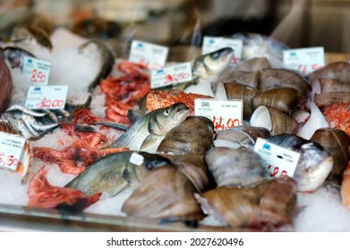 BERGAMO, ITALY - APRIL 2019: Assorted Fresh Fish Displayed On The Farmers Market In Bergamo, Italy