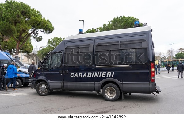 Bergamo, Italy. April 21, 2022. Italian police van\
in action in the streets of the city. Police van with riot\
protection. Transport of the policemen to the stadium to ensure the\
safety of the fans