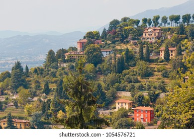 Bergamo, Italy - August 18, 2017: Panoramic view of the city of Bergamo from the castle walls. - Shutterstock ID 1054576721